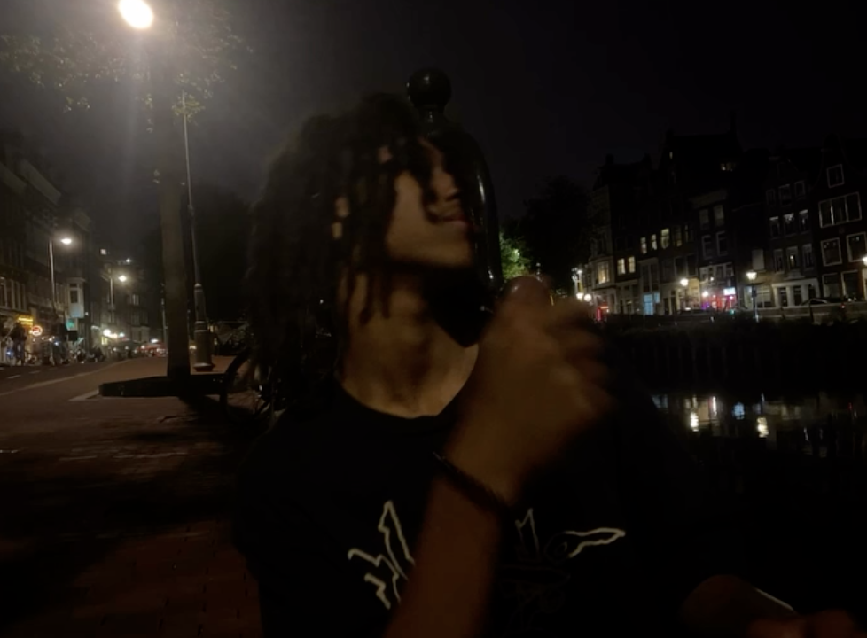 Dappie on an Amsterdam canal street at night