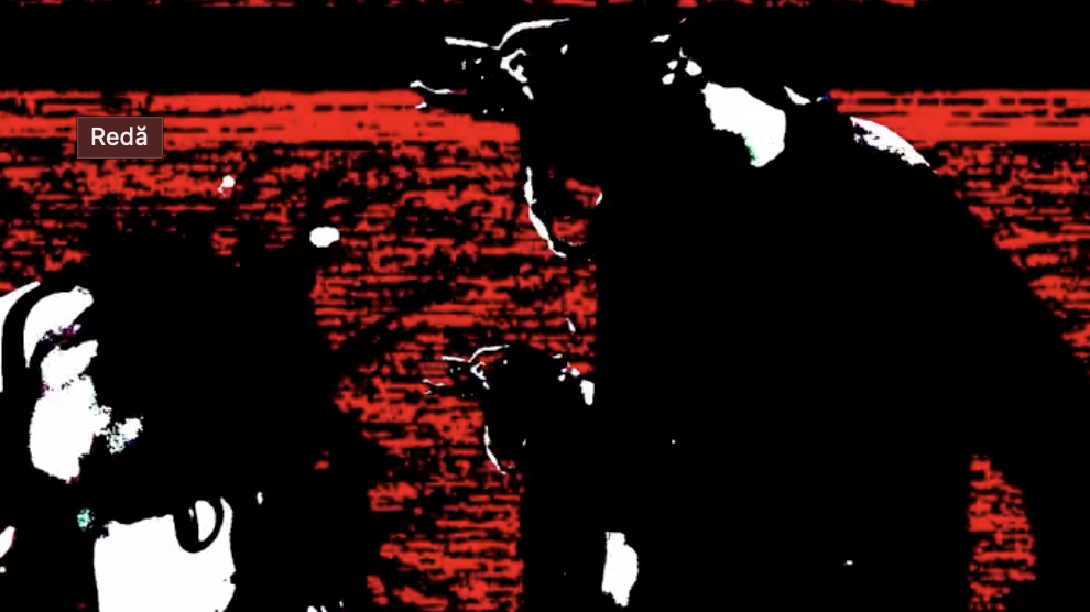 High-contrast red and black video still of Dappie